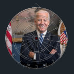 American President Joe Biden as Senator Dartboard<br><div class="desc">The photograph captures a moment in time before president elect Joe Biden appointed office of Vice President of the United States. Sunlight streams through a window, casting a warm glow on the figure of an Biden standing confidently in the centre of the frame. His arms are crossed, a gesture that...</div>