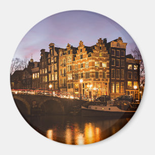Amsterdam canal houses at dusk round magnet