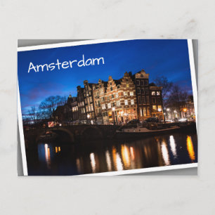 Amsterdam canal houses at night postcard