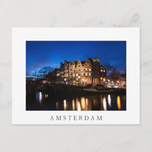 Amsterdam canal houses at night postcard