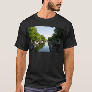 Amsterdam Canal with Houseboats and Lush Trees T-Shirt