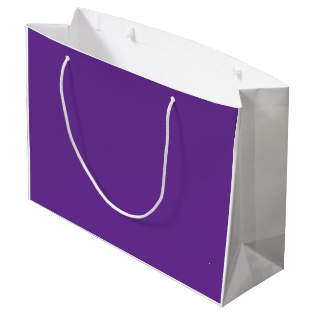 An abstract blend of vibrant purple and pink hues  large gift bag (Back Angled)