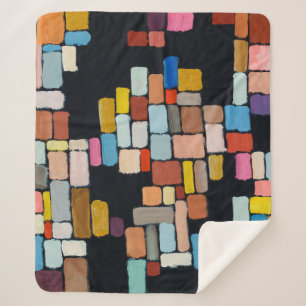 An abstract painting; geometric shapes in an irreg sherpa blanket