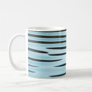 An abstract wave ripple background made from water coffee mug