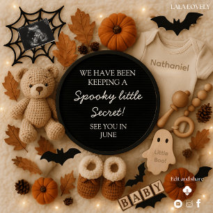 An adorable cosy fall pregnancy announcement 