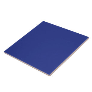 an aeroplane flying in the sky with a blue backgro ceramic tile
