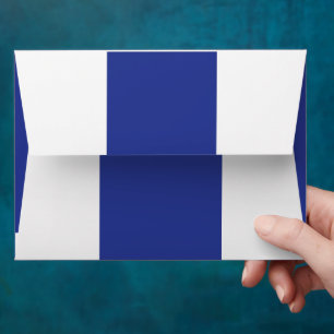 an aeroplane flying in the sky with a blue backgro envelope