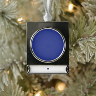 an aeroplane flying in the sky with a blue backgro silver plated banner ornament