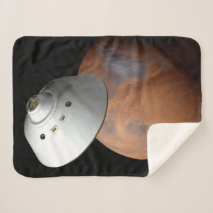 An Aeroshell-Encased Spacecraft Approaching Mars. Sherpa Blanket