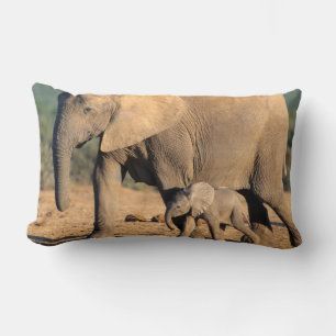 An African Elephant mother and calf on the move Lumbar Cushion