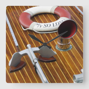 An Anchor And A Life-Buoy On A Wooden Boat Square Wall Clock
