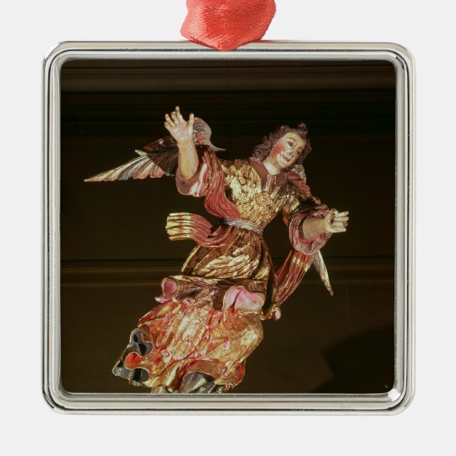 An angel above the altarpiece metal ornament (Front)