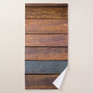 An antique wood wall texture background with metal bath towel