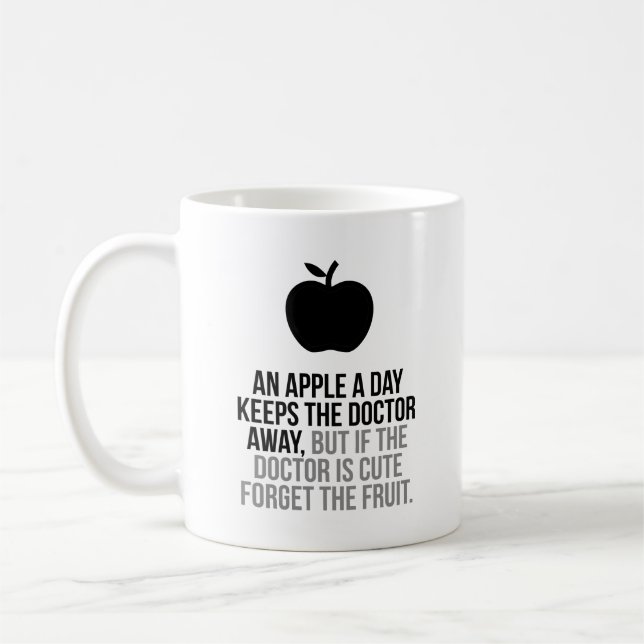 An Apple A Day Keeps The Doctor Away Coffee Mug (Left)