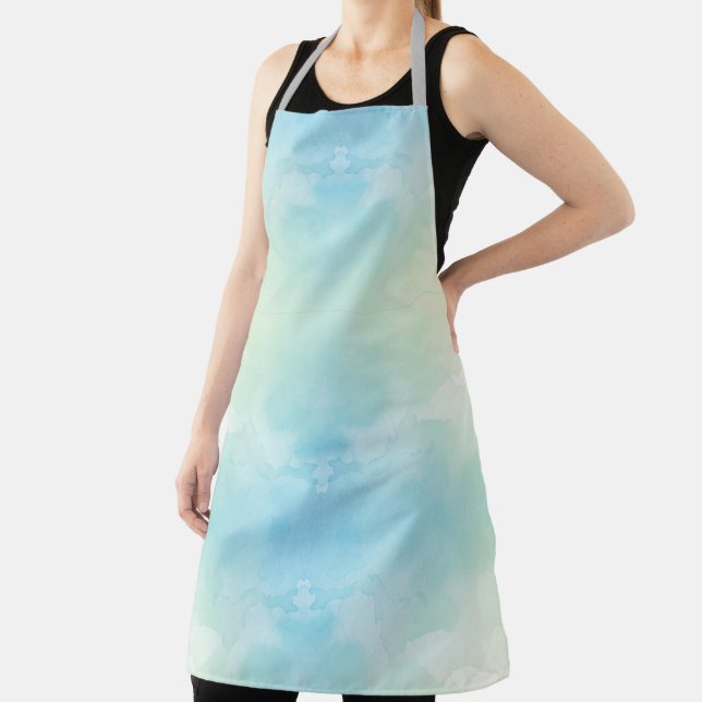 An apron with a calming pastel gradient of blue  (Insitu)