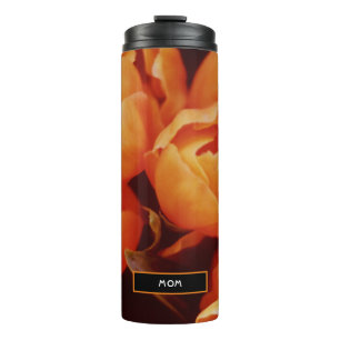 An Array of orange tulips Thermal Tumbler