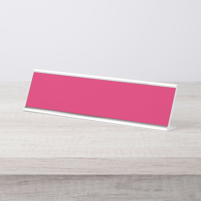 An array of red and pink flowers with lush green l desk name plate (Front)