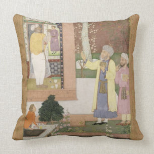 An artist decorating the interior of a garden pavi cushion