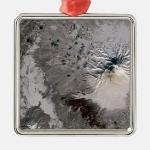 An ash rich plume rises metal ornament