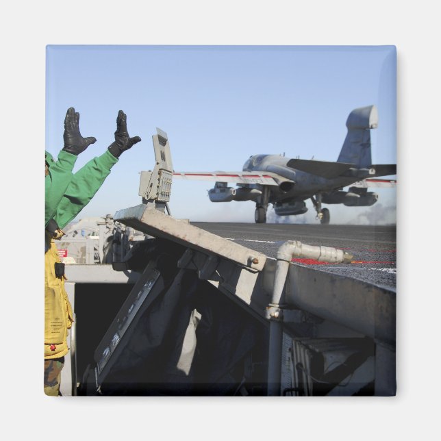 An EA-6B Prowler launches from the flight deck Magnet (Front)