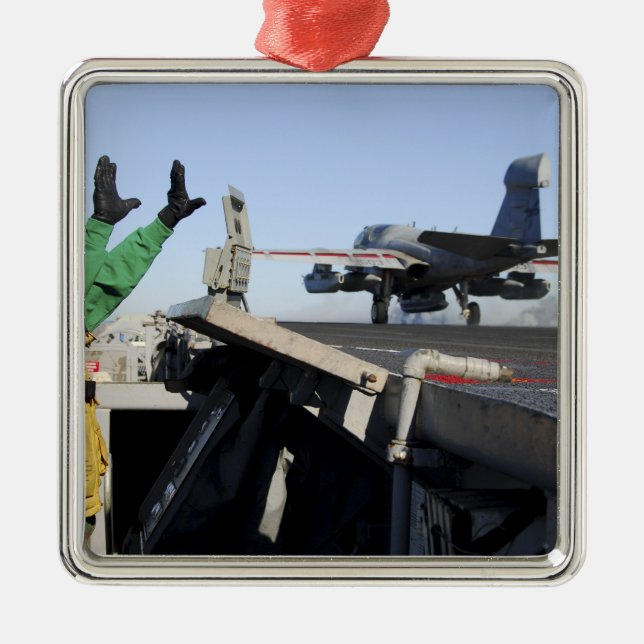 An EA-6B Prowler launches from the flight deck Metal Ornament (Front)