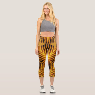 An elegant brown colour all over fabric pattern capri leggings