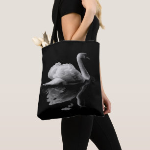 An Elegant White Swan On A Black Background Tote Bag