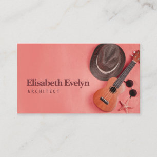 An elevated view of ukulele; sunglasses business card