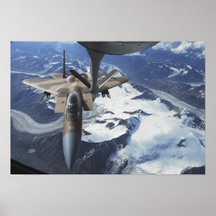 An F-15C Eagle aircraft sits behind a KC-135R Poster