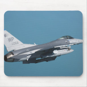 An F-16 Fighting Falcon in flight Mouse Pad