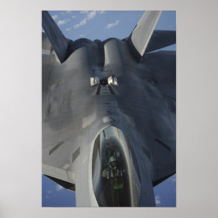 An F-22 Raptor moves into position to receive f Poster