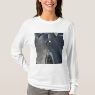 An F-22 Raptor moves into position to receive f T-Shirt