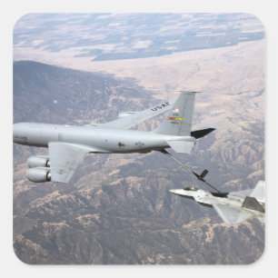 An F-22 Raptor receives fuel from a KC-135 Square Sticker
