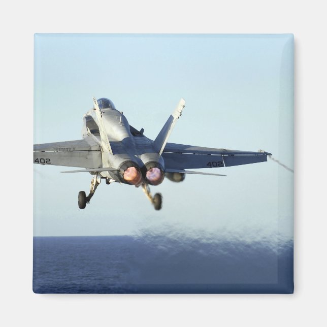 An F/A-18C Hornet launches from the flight deck Magnet (Front)