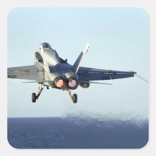 An F/A-18C Hornet launches from the flight deck Square Sticker (Front)