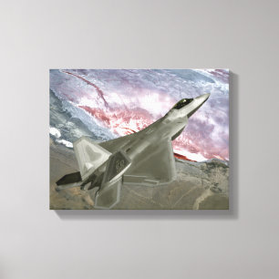 An F/A-22 Raptor flies a training mission Canvas Print