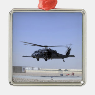 An HH-60G Pave Hawk taking off from Camp Bastio Metal Tree Decoration