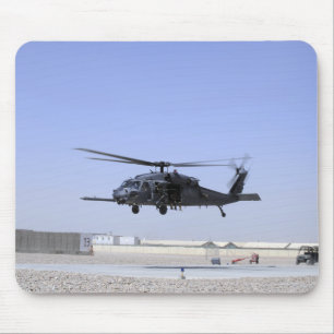 An HH-60G Pave Hawk taking off from Camp Bastio Mouse Pad