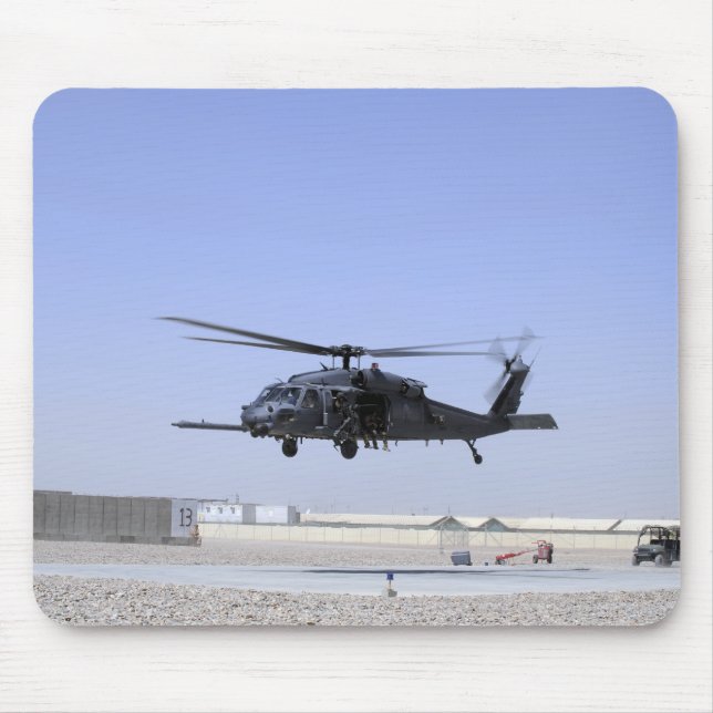 An HH-60G Pave Hawk taking off from Camp Bastio Mouse Pad (Front)