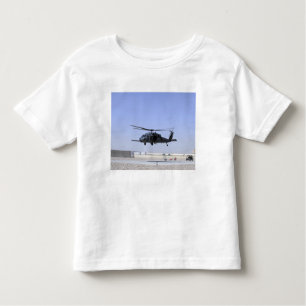 An HH-60G Pave Hawk taking off from Camp Bastio Toddler T-Shirt