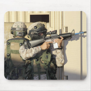 An infantry scout aims his weapon mouse pad