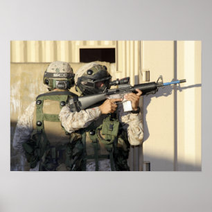 An infantry scout aims his weapon poster