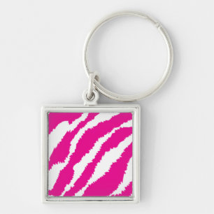 An intricate floral pattern in pink and white, art key ring