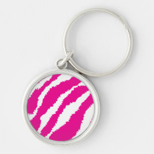 An intricate floral pattern in pink and white, art key ring