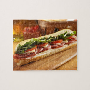 An Italian sub sandwich with 2 Jigsaw Puzzle