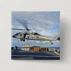 An MH-60S Seahawk prepares to deliver ammunitio 15 Cm Square Badge