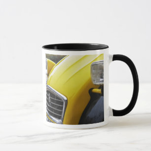 An old black and yellow Citroen 2CV 2 CV, detail Mug