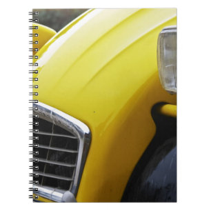 An old black and yellow Citroen 2CV 2 CV, detail Notebook