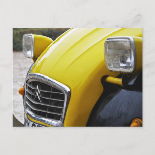 An old black and yellow Citroen 2CV 2 CV, detail Postcard