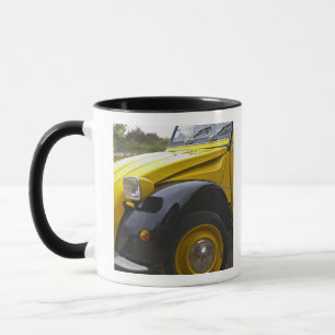 An old black and yellow Citroen 2CV 2 CV, Mug